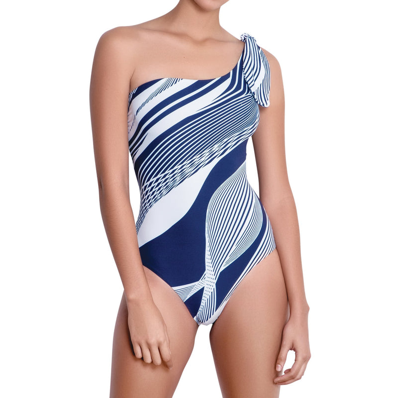 SOPHIE asymmetric one piece, printed swimsuit by ALMA swimwear – front view 1